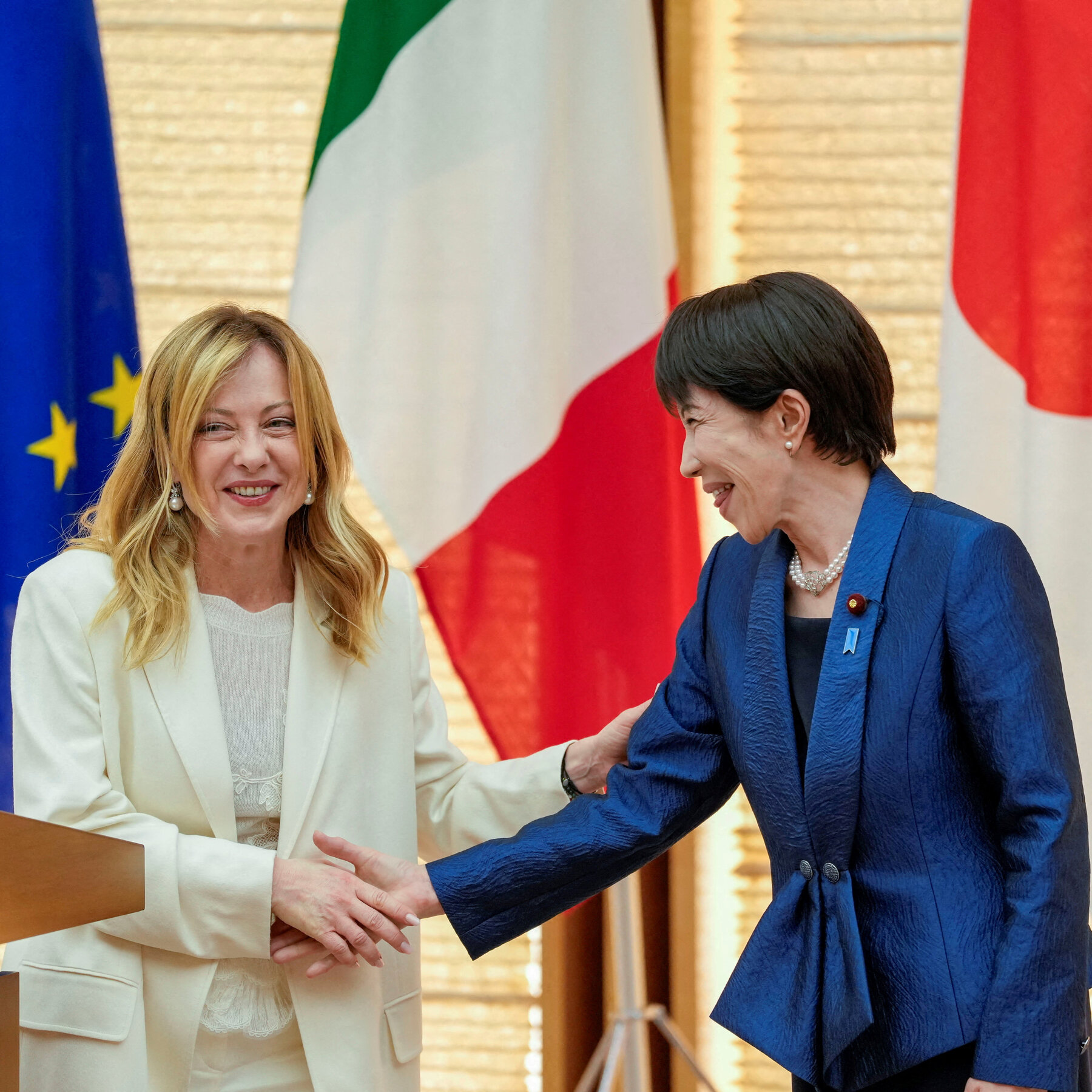 Right-Wing Leaders of Italy and Japan Become Fast Friends